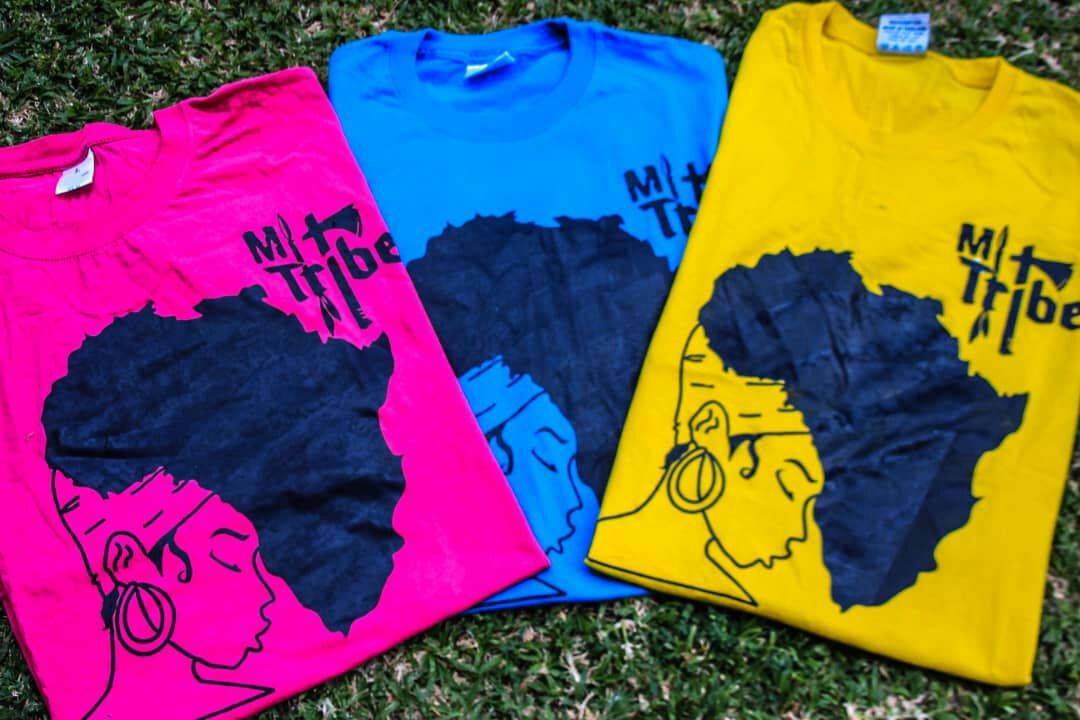 Mi-Tribe Africa portrait print T-shirts in pink, blue, and yellow